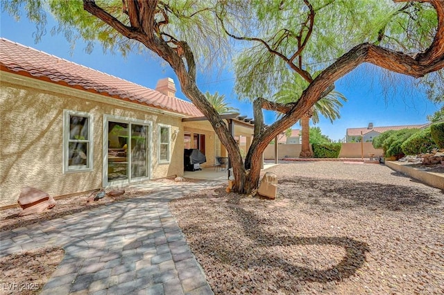 1734 Marshall Dr, Henderson, NV 89014 - fenced backyard with a patio
