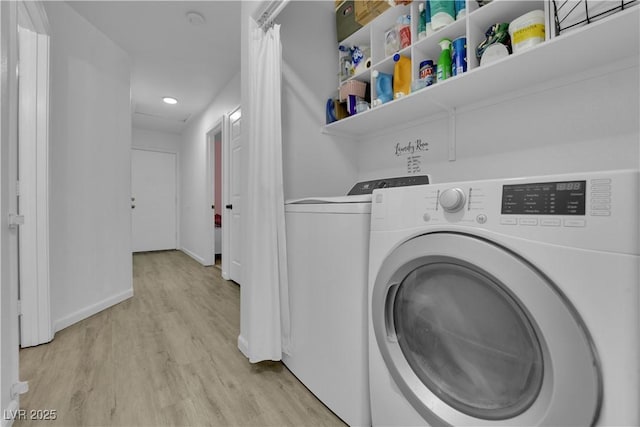 7316 Young Doe Ave, Las Vegas, NV 89130 - laundry room with washing machine and clothes dryer, light wood-style floors, and recessed lighting