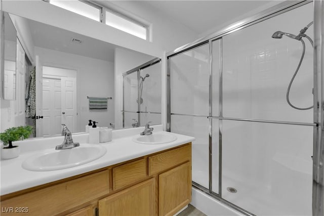 7316 Young Doe Ave, Las Vegas, NV 89130 - bathroom with a shower stall and double vanity