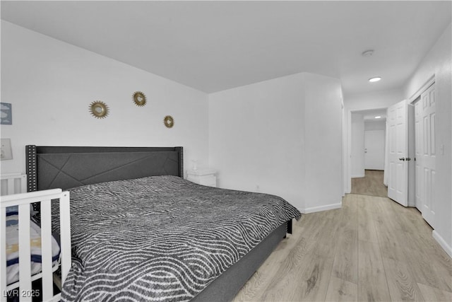 7316 Young Doe Ave, Las Vegas, NV 89130 - bedroom with wood finished floors and recessed lighting