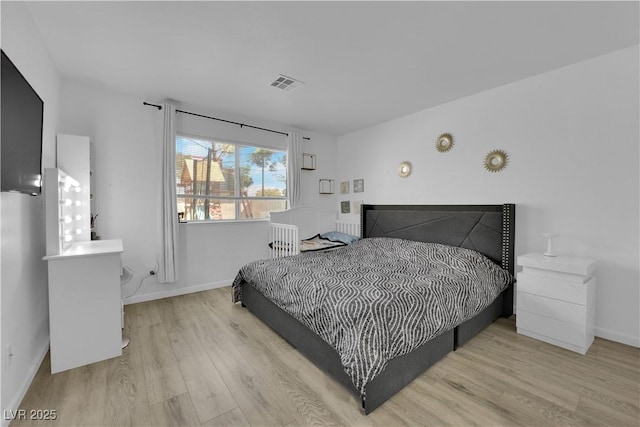7316 Young Doe Ave, Las Vegas, NV 89130 - bedroom featuring wood finished floors and baseboards