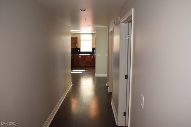 150 N Las Vegas Blvd Unit 1217, Las Vegas, NV 89101 - hall with dark wood-style flooring and baseboards