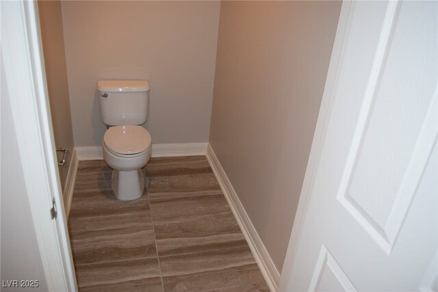 150 N Las Vegas Blvd Unit 1217, Las Vegas, NV 89101 - bathroom featuring toilet and wood finished floors