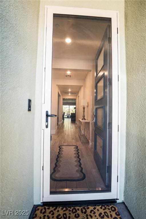 9584 Jadeite Ln, Las Vegas, NV 89143 - doorway to property with stucco siding