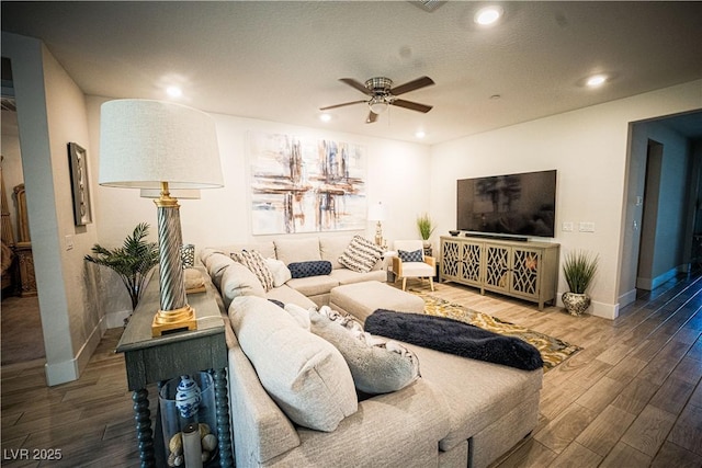9584 Jadeite Ln, Las Vegas, NV 89143 - living area featuring a ceiling fan, recessed lighting, and wood finished floors