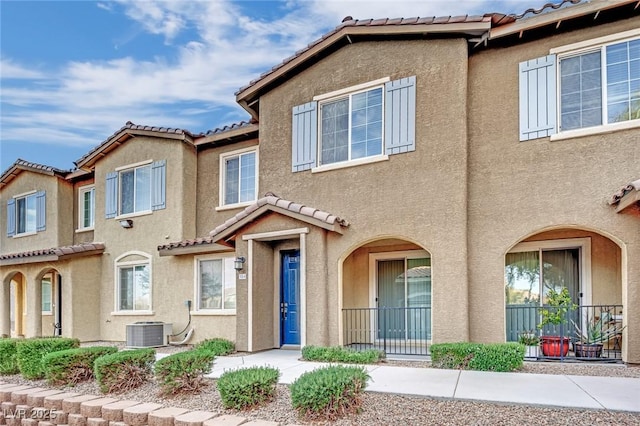 8520 Insignia Ave Unit 104, Las Vegas, NV 89178 - multi unit property featuring a tiled roof and stucco siding