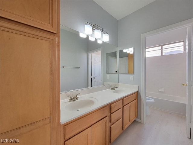 10482 Calico Pines Ave, Las Vegas, NV 89135 - bathroom with double vanity and tub / shower combination