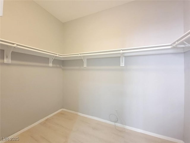 10482 Calico Pines Ave, Las Vegas, NV 89135 - walk in closet with light wood finished floors