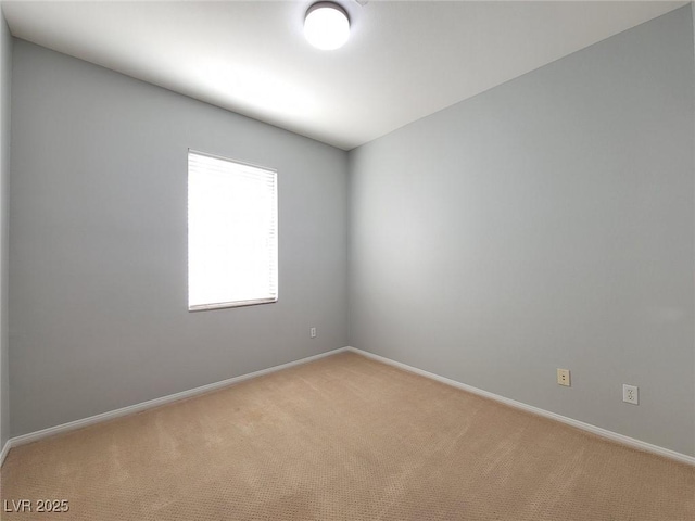 10482 Calico Pines Ave, Las Vegas, NV 89135 - spare room with light carpet and baseboards