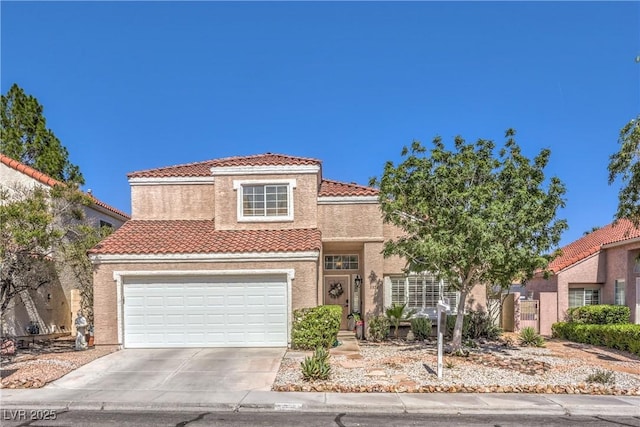 3324 Canyon Lake Dr, Las Vegas, NV 89117 - mediterranean / spanish house with a tiled roof, concrete driveway, stucco siding, and an attached garage