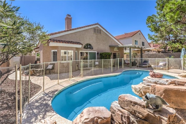 3324 Canyon Lake Dr, Las Vegas, NV 89117 - view of swimming pool with a ceiling fan, a fenced backyard, and a patio