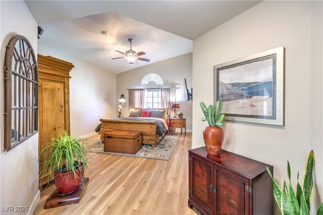 3324 Canyon Lake Dr, Las Vegas, NV 89117 - bedroom with light wood finished floors and vaulted ceiling
