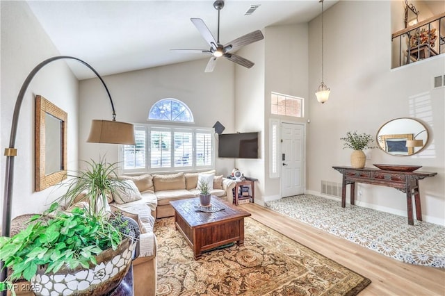 3324 Canyon Lake Dr, Las Vegas, NV 89117 - living area with wood finished floors, high vaulted ceiling, and ceiling fan