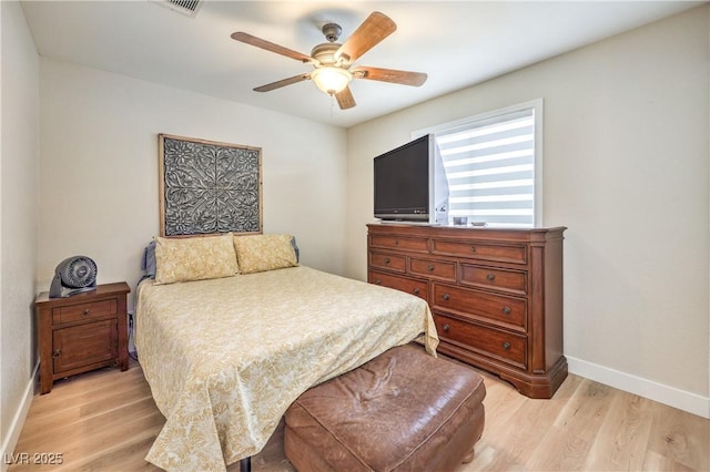 3324 Canyon Lake Dr, Las Vegas, NV 89117 - bedroom with light wood finished floors and ceiling fan