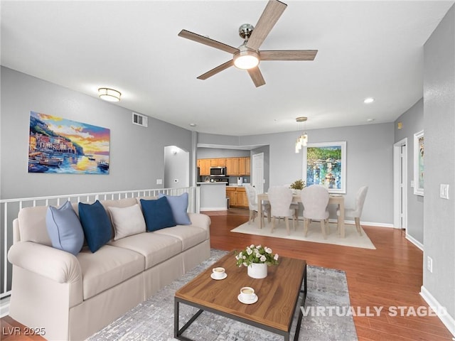 5855 Valley Dr Unit 2119, North Las Vegas, NV 89031 - living area featuring a ceiling fan, wood finished floors, and recessed lighting