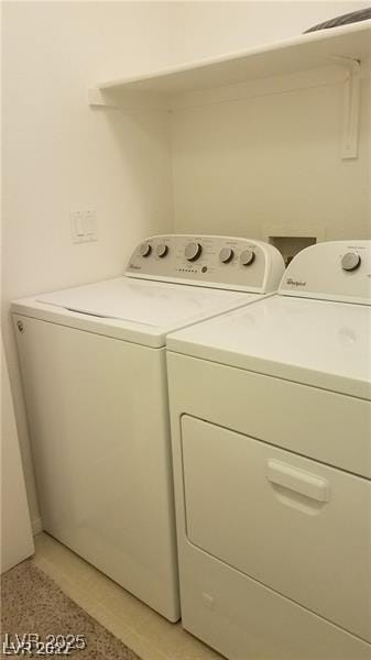 9470 Peace Way Unit 206, Las Vegas, NV 89147 - laundry room featuring washer and clothes dryer