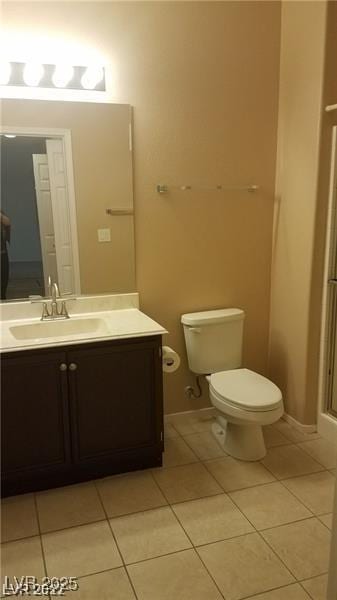 9470 Peace Way Unit 206, Las Vegas, NV 89147 - bathroom featuring vanity and tile patterned flooring
