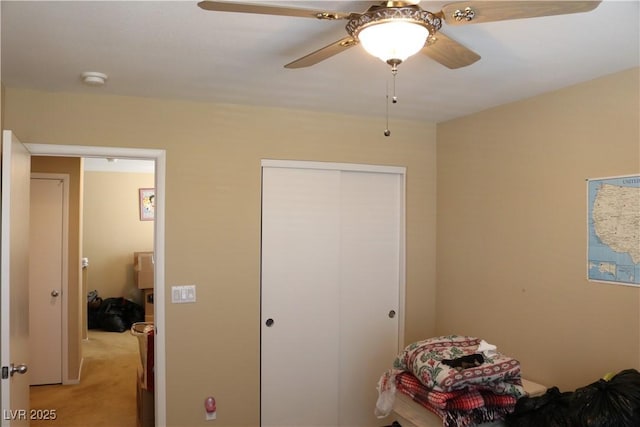 3237 Aiken St, North Las Vegas, NV 89032 - unfurnished bedroom with light colored carpet, a closet, and ceiling fan