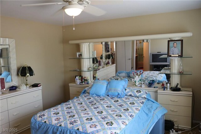 3237 Aiken St, North Las Vegas, NV 89032 - bedroom featuring a ceiling fan