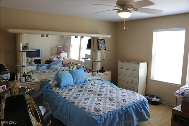 3237 Aiken St, North Las Vegas, NV 89032 - bedroom featuring multiple windows, carpet floors, and a ceiling fan