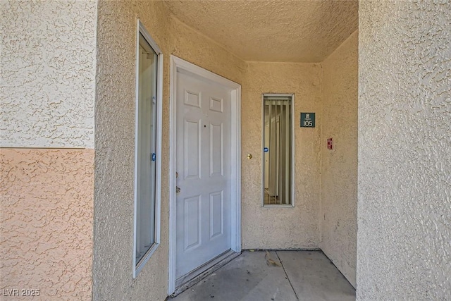 5000 Red Rock St Unit 105, Las Vegas, NV 89118 - view of exterior entry with stucco siding