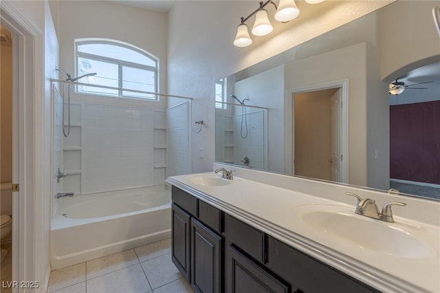 4855 Double Down Dr Unit 103, Las Vegas, NV 89122 - bathroom with shower / washtub combination, double vanity, tile patterned flooring, and ceiling fan