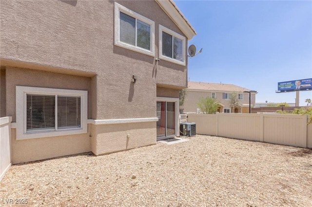 4855 Double Down Dr Unit 103, Las Vegas, NV 89122 - back of house with stucco siding