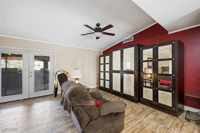 4544 Plaza De Vista St, Las Vegas, NV 89120 - living room featuring french doors, wood finished floors, a ceiling fan, lofted ceiling, and ornamental molding