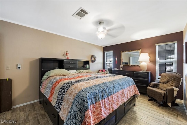 4544 Plaza De Vista St, Las Vegas, NV 89120 - bedroom with wood-type flooring, ceiling fan, and ornamental molding