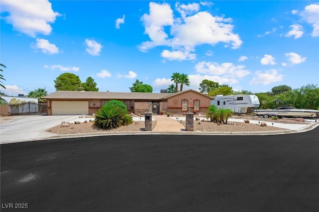 4544 Plaza De Vista St, Las Vegas, NV 89120 - ranch-style home with concrete driveway and a garage