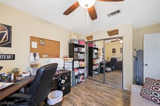 4544 Plaza De Vista St, Las Vegas, NV 89120 - home office with a ceiling fan and wood finished floors