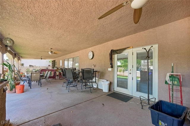 4544 Plaza De Vista St, Las Vegas, NV 89120 - view of patio with french doors, outdoor dining space, and a ceiling fan
