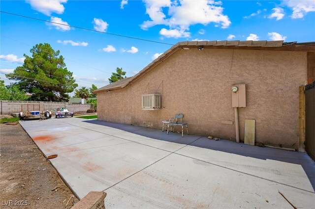 4544 Plaza De Vista St, Las Vegas, NV 89120 - view of property exterior featuring a patio and stucco siding