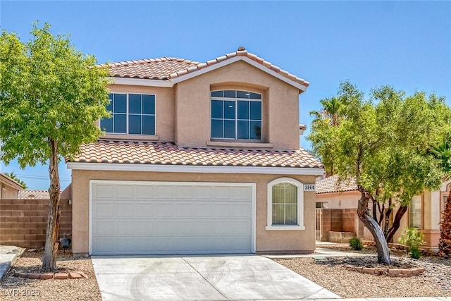 3664 Summer Picnic Ct, Las Vegas, NV 89147 - mediterranean / spanish home featuring a tile roof, a garage, concrete driveway, and stucco siding