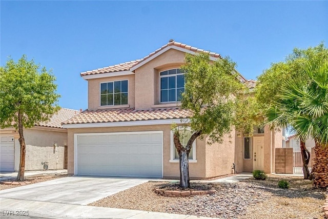 3664 Summer Picnic Ct, Las Vegas, NV 89147 - mediterranean / spanish-style house featuring a tiled roof, stucco siding, concrete driveway, and an attached garage