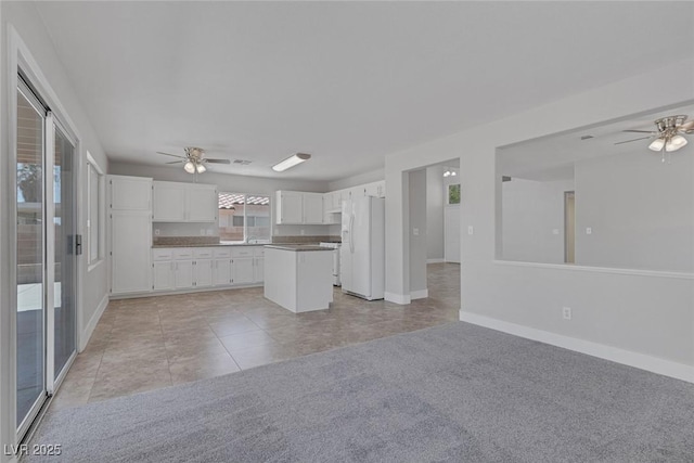 3664 Summer Picnic Ct, Las Vegas, NV 89147 - kitchen featuring ceiling fan, white fridge with ice dispenser, and open floor plan