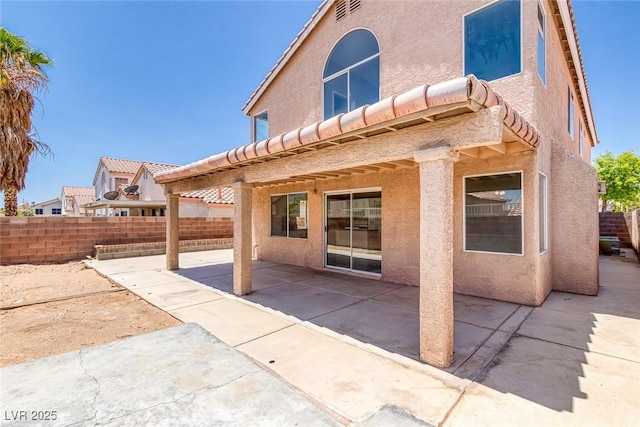 3664 Summer Picnic Ct, Las Vegas, NV 89147 - back of property featuring a fenced backyard, a patio area, and stucco siding