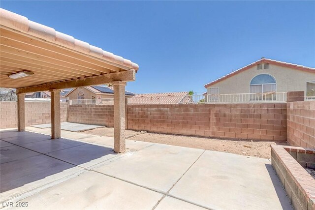 3664 Summer Picnic Ct, Las Vegas, NV 89147 - fenced backyard with a patio