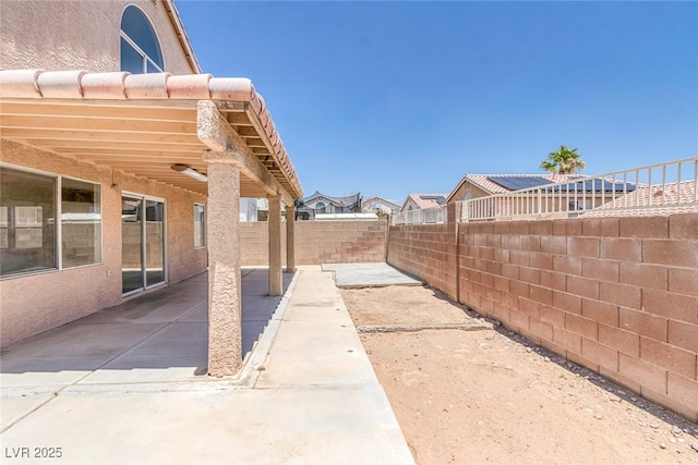 3664 Summer Picnic Ct, Las Vegas, NV 89147 - fenced backyard with a patio area
