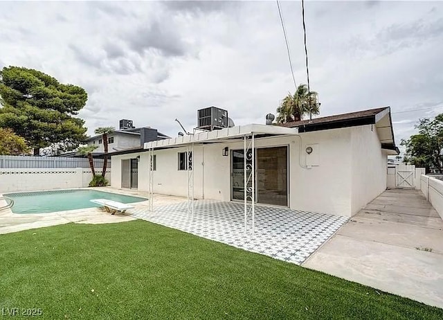 5321 Westleigh Ave, Las Vegas, NV 89146 - rear view of house featuring a patio area, a fenced backyard, and stucco siding