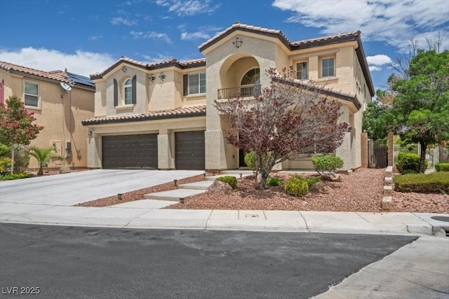 7012 Geese Gathering St, North Las Vegas, NV 89084 - mediterranean / spanish house with a garage, a tiled roof, and stucco siding