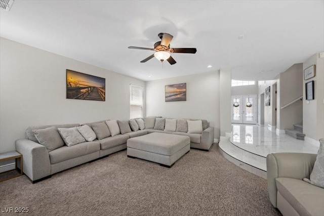 7012 Geese Gathering St, North Las Vegas, NV 89084 - carpeted living room with ceiling fan and french doors