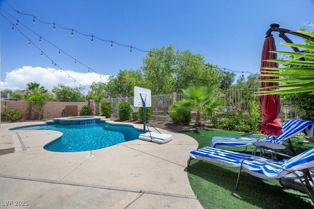 7012 Geese Gathering St, North Las Vegas, NV 89084 - view of swimming pool with a fenced backyard, a patio, and a pool with connected hot tub