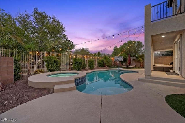7012 Geese Gathering St, North Las Vegas, NV 89084 - view of pool with a patio area, a fenced backyard, and a pool with connected hot tub