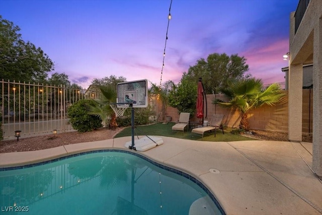 7012 Geese Gathering St, North Las Vegas, NV 89084 - view of pool with a fenced backyard and a patio