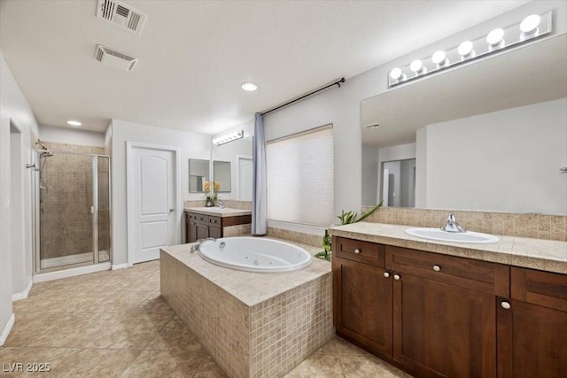 7012 Geese Gathering St, North Las Vegas, NV 89084 - full bathroom featuring a shower stall, two vanities, a tub with jets, tile patterned flooring, and recessed lighting