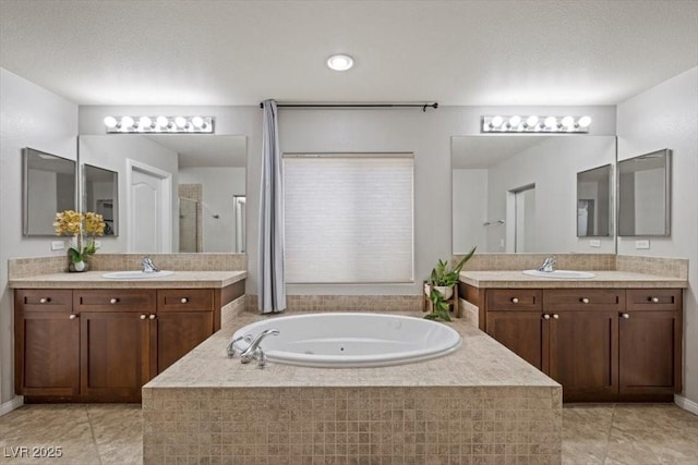 7012 Geese Gathering St, North Las Vegas, NV 89084 - full bath featuring a whirlpool tub, two vanities, tile patterned flooring, and a walk in shower