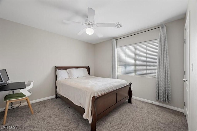7012 Geese Gathering St, North Las Vegas, NV 89084 - carpeted bedroom with baseboards and a ceiling fan