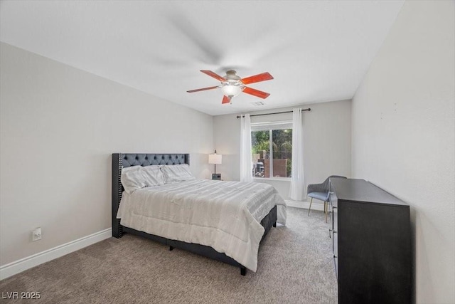 7012 Geese Gathering St, North Las Vegas, NV 89084 - carpeted bedroom featuring baseboards and a ceiling fan