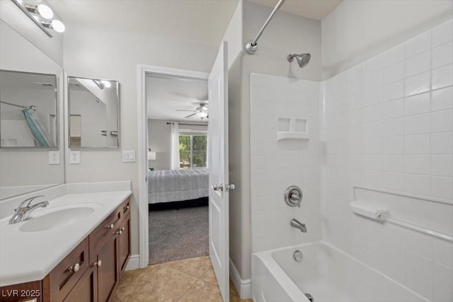 7012 Geese Gathering St, North Las Vegas, NV 89084 - full bath featuring bathtub / shower combination, vanity, connected bathroom, tile patterned flooring, and ceiling fan